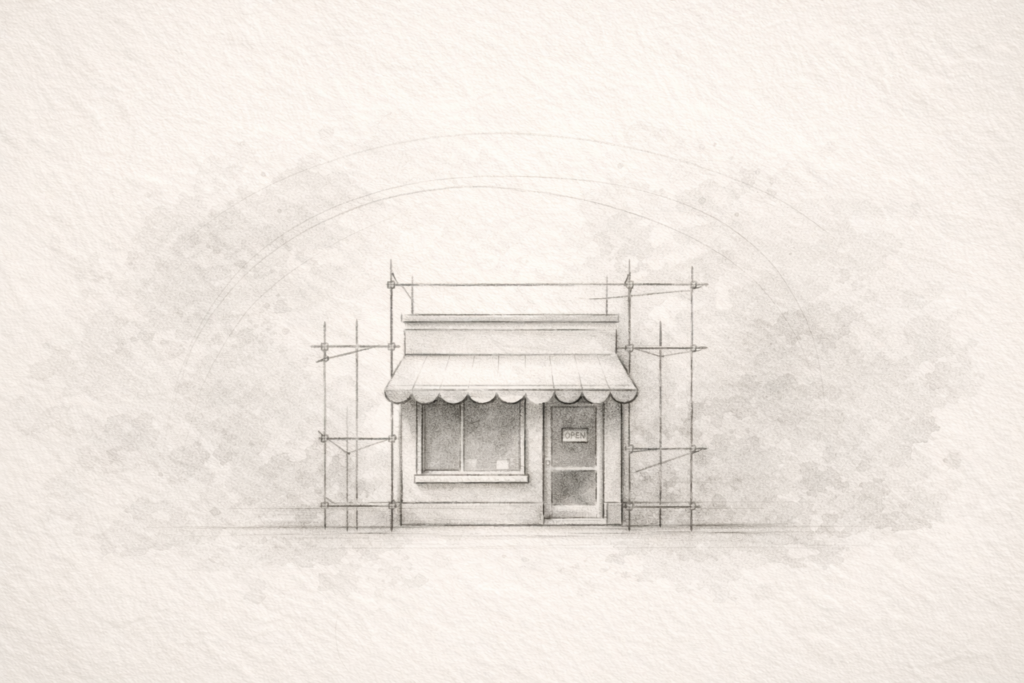 Conceptual composition showing a small abstract storefront with scaffolding gently surrounding it, subtle fine lines reinforcing its structure.